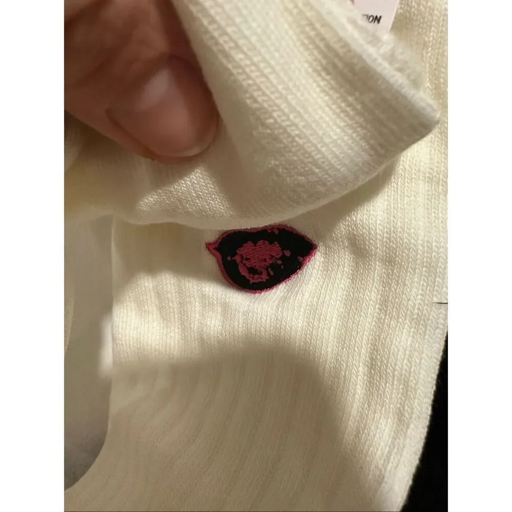 Mismatched Uniqlo x Artist Socks – KAWS Elmo & Andy Warhol Lips
